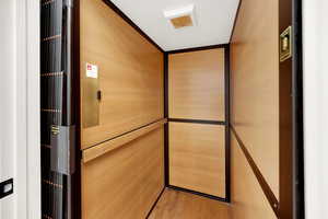 Elevator with wood finished floors