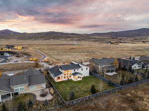 Aerial view at dusk of a residential view and a mountain view