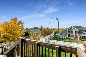 Balcony featuring a residential view