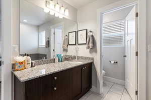 Master Bathroom featuring vanity and light tile patterned floors