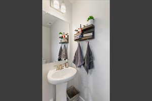 Half bathroom with baseboards
