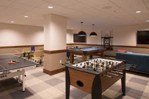 Game room with recessed lighting, billiards table, and a drop ceiling