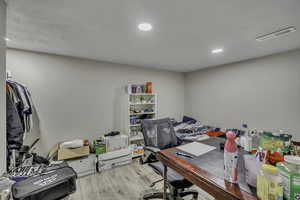 Home office featuring recessed lighting and light wood-type flooring