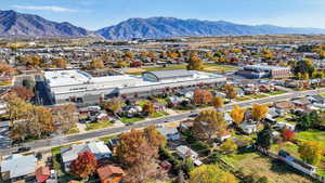 Aerial perspective of suburban area with a mountain backdrop