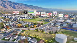 View of property location with a mountain backdrop and property boundaries highlighted