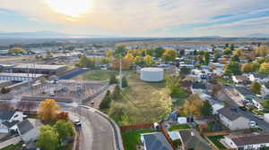 Aerial perspective of suburban area featuring a mountain backdrop
