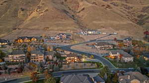 Aerial overview of property's location with nearby suburban area