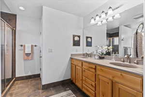 Master bathroom with double sinks, separate shower and garden tub.