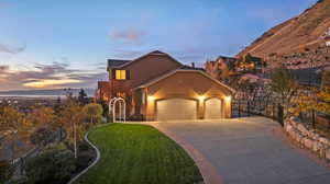 3 car garage, stamped concrete, gate and extra parking.