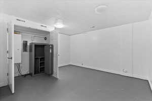 This room can be used for storage, exercise room or craft room. It has a closet but no window. Safe is included in sale.