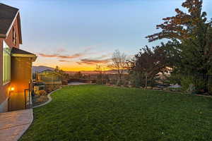 Fenced backyard featuring a patio area