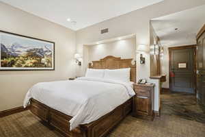 Bedroom featuring baseboards and recessed lighting