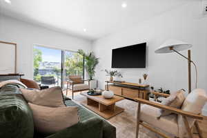 Living room featuring recessed lighting and wood finished floors