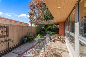 Fenced sideyard with a patio area