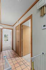 Hall to Primary Suite and laundry room.