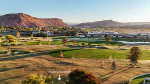 View of home's community featuring view of golf course, a mountain view, and residential view