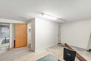 Storage room that could also be a bedroom (currently does not have carpet in it)