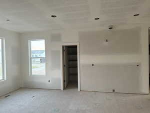 Empty room featuring a textured ceiling