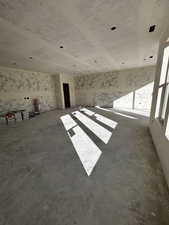 Spare room with concrete flooring