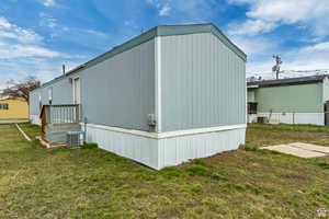 View of property exterior featuring a central air condition unit