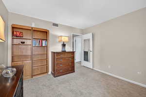 Bedroom with murphy closet/bookcase