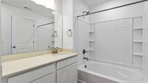 Full bathroom featuring bathtub / shower combination and vanity