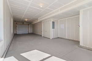 Garage featuring electric panel