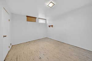 Unfurnished room with tile patterned floors and baseboards