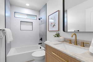 Full bathroom featuring vanity and tub / shower combination