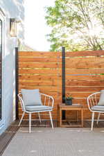 View of wooden balcony featuring a deck