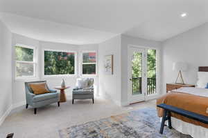 Bedroom with carpet flooring, access to outside, and recessed lighting