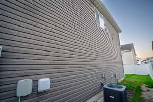 View of home's exterior featuring a central AC unit