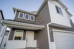 View of front of home featuring a garage