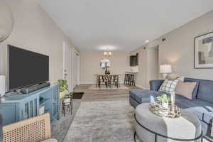 Living room looking into the dining and kitchen area