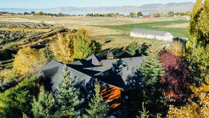 Overview of rural landscape featuring a water and mountain view