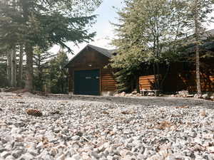 View of front of house featuring an outdoor structure