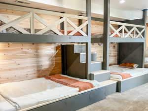 Unfurnished bedroom with carpet flooring and a textured ceiling