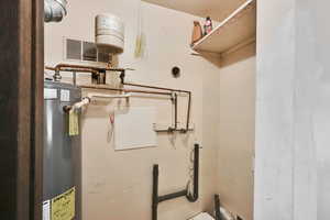 Utility room with electric water heater