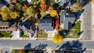 Aerial view of residential area featuring property parcel outlined