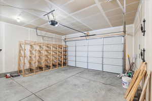 Garage featuring a garage door opener