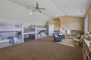 Carpeted bedroom with vaulted ceiling