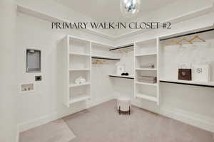 Primary Suite Walk-in Closet # 2 with Stackable Laundry