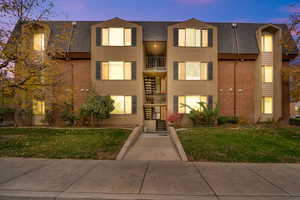 View of property with stairs