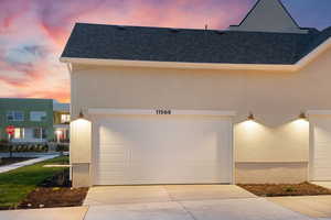 Garage featuring driveway