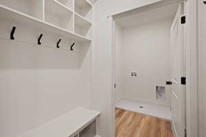 Mudroom featuring light wood-type flooring