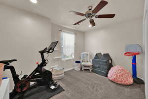 Workout area with carpet flooring, recessed lighting, and a ceiling fan
