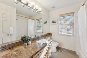 Guest bathroom with updated granite countertop and plumbed to add a second sink