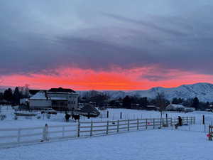 View of yard layered in snow