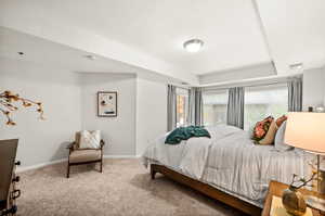 Second-floor primary suite with door opening onto the balcony