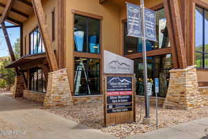 Entrance to property featuring stucco siding